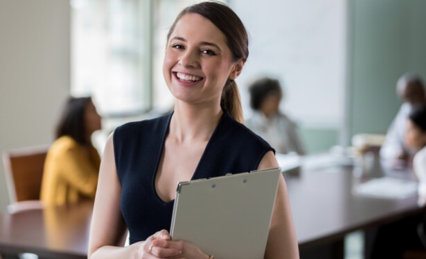 businesswoman holding a clipboard