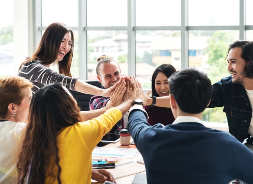 business colleagues in a team huddle