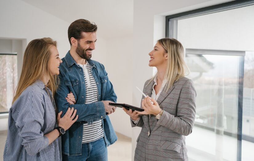 three people engaged in a conversation